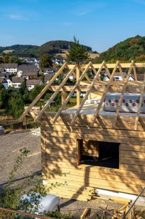 Shell of a wooden house, building, completely made of wood, in the village of Hesborn, in