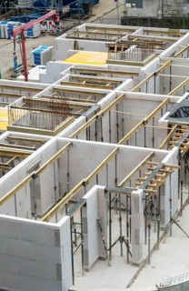 Building site, shell construction, walls of a residential building are finished, lift shaft