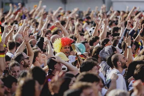 Fans react during the European Championship preliminary round match between Germany and Hungary on