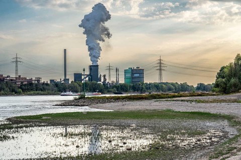 HKM Huckingen steelworks, coking plant, cargo ship on the Rhine, at extremely low water, Duisburg,