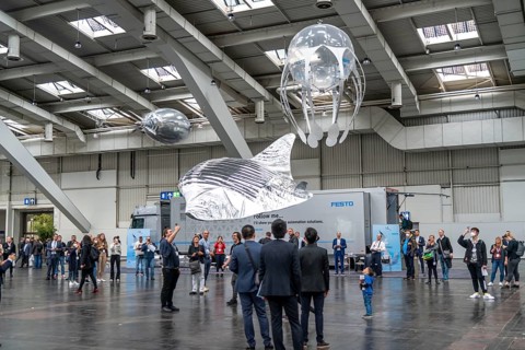 Mechanical flying objects, filled with helium, controlled by fine mechanics, movements copied from