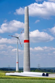 Wind farm near Brilon-Radlinghausen, new wind turbine being built, tower elements and rotors ready