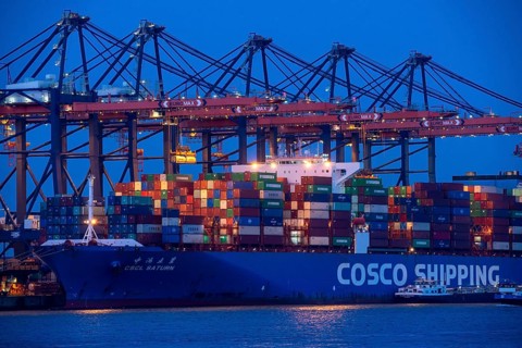 Container ship of the shipping company Cosco Shipping, CSCL SATURN, being loaded and unloaded,