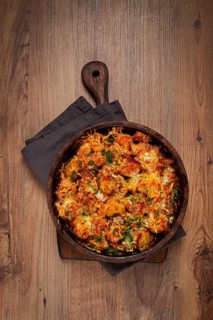 Baked fish with potatoes and cheese, gratin, homemade, no people
