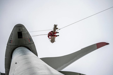 Height rescuers from the Oberhausen professional fire brigade practise abseiling from a wind
