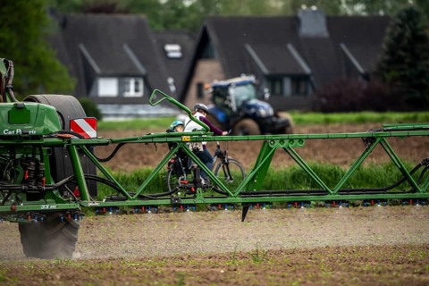 Agriculture, pesticide being sprayed on a field, sugar beet seedlings, North Rhine-Westphalia,