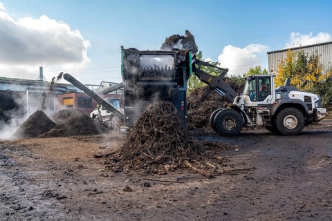 Composting plant, organic waste is composted, sorted by size, smaller parts are reused as compost,