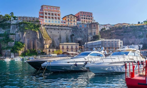 Steep coast of the village at the harbour with sports boats, Sorrento, Sorrento Peninsula, Gulf of