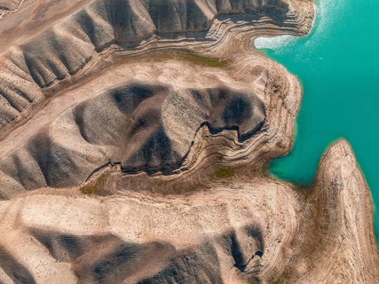 Top-Down, Barren landscape, Aerial view, Erosion landscape with canyons at the river Naryn,