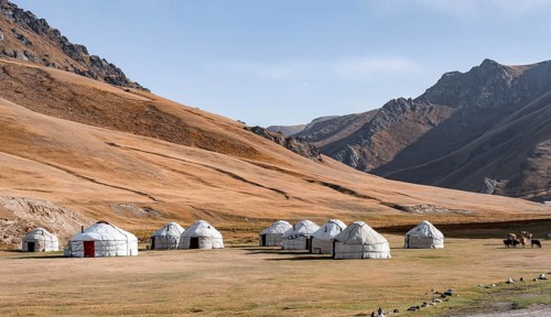 Yurts with yellow hills, Atbashy district in the Naryn region, Kyrgyzstan, Asia