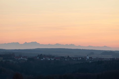 Alpine panorama near Magolsheim. Säntis, Swiss Alps at cloudless sunset with a view of Mehrstetten.