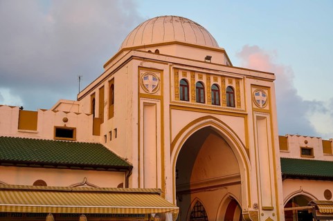Market Hall, Nea Agora, building with a large dome and arches, historically designed with pink and