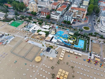 Bathing beach in Rimini. Bathing beach on the Adriatic in bad weather. All deckchairs are free.