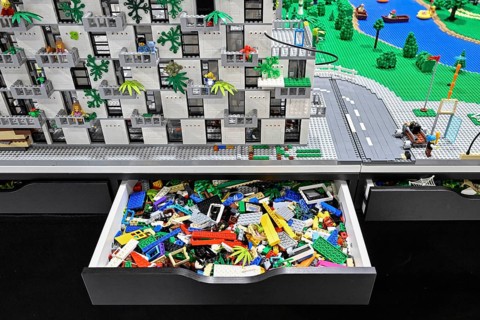 Drawer toy building blocks and Lego apartment block with surroundings