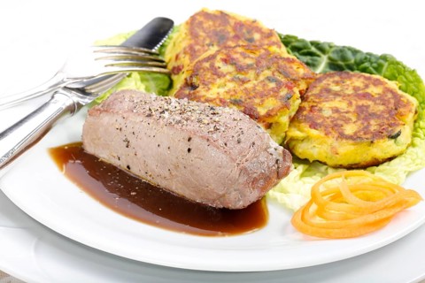 Swabian cuisine, medallions of wild boar with savoy cabbage cakes, meat dish, roasted, hearty, home