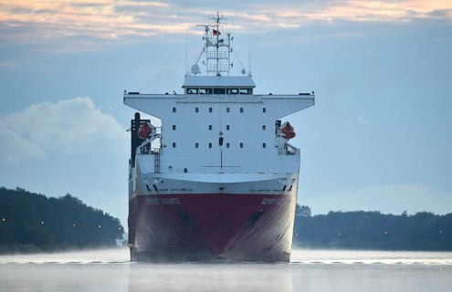 RoRo cargo ship Super Fast Levante travelling through the Kiel Canal at sunrise, Kiel Canal,
