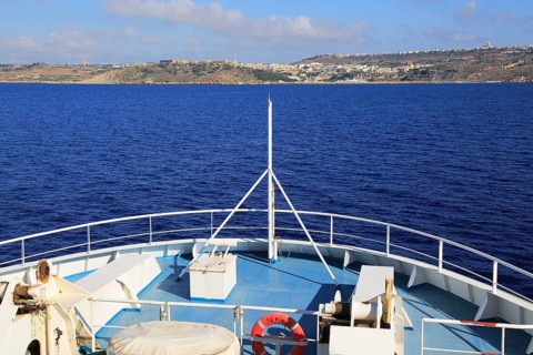 Bow of Gozo Channel Line ferry ship approaching Mgarr, Gozo, Malta, Europe