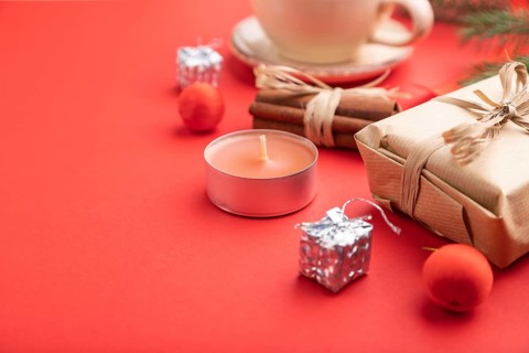 Christmas or New Year composition. Decorations, box, cinnamon, fir and spruce branches, cup of