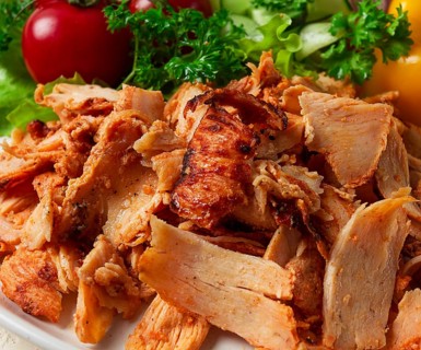Gyros, chicken, with vegetables on plates, disassembled shawarma, fast food, appetizer, cooking