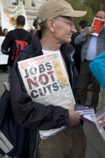 May Day march and rally at Trafalgar Square, London, England, UK May 1st, 2010 Man holding