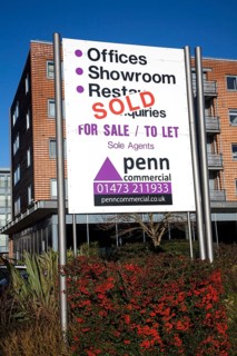 Sold sign for Penn estate agent commercial property at the Waterfront development around the Wet