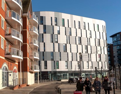 University Campus Suffolk buildings and new apartments in the Wet Dock, Ipswich, Suffolk, England,