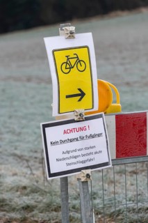 Barrier due to flooding and danger of falling rocks, barrier, landslide, traffic signs, attention