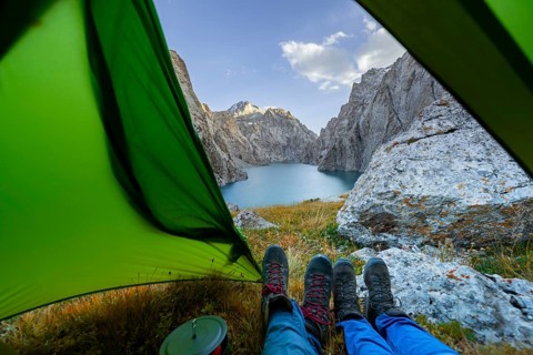 Wild camping, camping in the wilderness with a tent, Kol Suu mountain lake, Sary Beles Mountains,