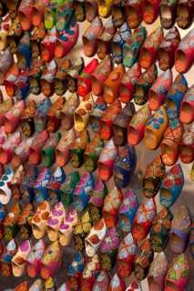 Small babouche magnets on a market, shoes, painted, trade, market, trader, bazaar, offer,
