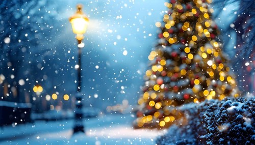 Christmas Eve with snowflakes fall under the light of a streetlamp with a decorated tree in the