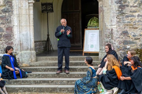 Satish Kumar speaking at graduation event, Schumacher College, Dartington Hall estate, Totnes,