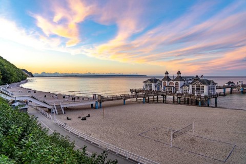 The pier of Sellin, evening mood, sunset, 394 metres long, with restaurant, jetty, beach chairs,