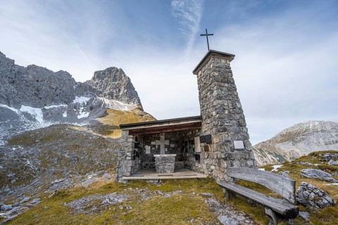 Lamsenjoch Chapel, memorial for mountaineers who died in an accident, in autumn, rocky summit of