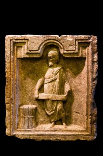Stele of Togatus with scrolls, 3rd century, Tergestino Lapidarium, Castle of San Giusto, medieval