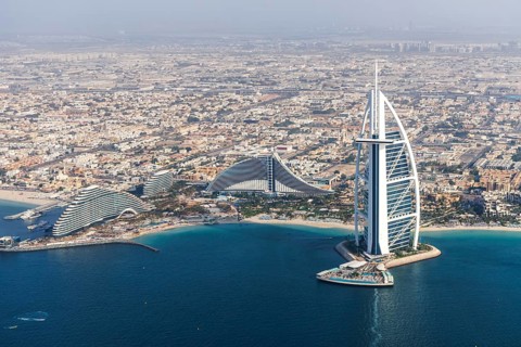 Dubai Burj Al Arab luxury hotel aerial view aerial view by the sea from above in Dubai, United Arab