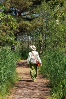 Elderly woman, trees, circular hiking trail, Darßer Ort, Born a. Darß, Mecklenburg-Vorpommern,