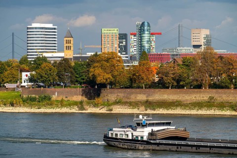 The skyline of Düsseldorf, with the skyscrapers in the Media Harbour, Rhine bridges, residential