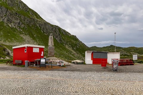 Gotthard Pass, pass summit with closed snack bar. Mountain scenery and landscape near Airolo,