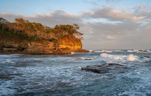 Cliffs and sea at sunset, Playa Cocalito, coastal landscape, Pacific coast, Nicoya Peninsula,