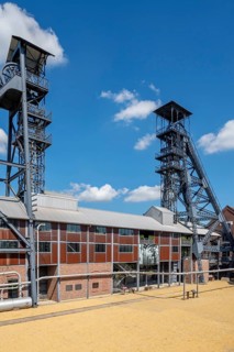 Two colliery headframes and coal mine buildings at Le Bois du Cazier, coal mining museum at