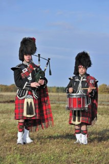 Scottish bagpipers playing pipes and drums, Scotland, UK