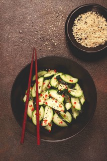 Chinese salad, cucumbers with chili pepper and sesame seeds, homemade, no people