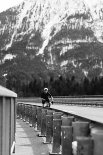 Road bike rider in spring between Lechtal and Tannheimer Tal in front of picturesque scenery of the