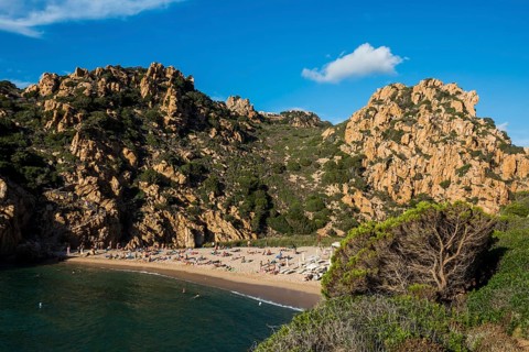 Red rocks and picturesque beach, Spiaggia di Cala li Cossi, Costa Paradiso, Sardinia, Italy, Europe