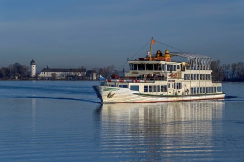 Excursion boat on the Chiemsee in winter, behind Fraueninsel, Upper Bavaria, Bavaria, Germany,