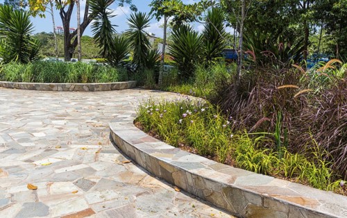 Retaining wall made of natural stone in a botanical garden