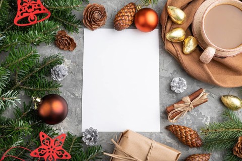 Christmas or New Year frame composition, template. Decorations, cones, cinnamon, fir and spruce