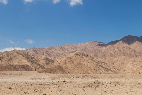 Red mountains, rocks and blue sky. Egypt, the Sinai Peninsula, Dahab
