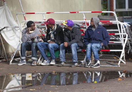 Refugees from Syria waiting to be registered at the Central Reception Centre for Asylum Seekers at