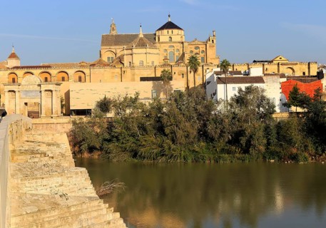 River Rio Guadalquivir and historic Mezquita cathedral buildings, Great Mosque, Cordoba, Spain,
